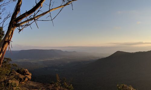 Scenic view of mountains against sky during sunset