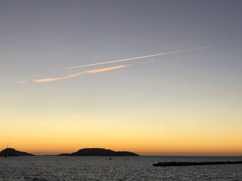 Scenic view of sea against sky during sunset