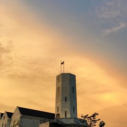 Low angle view of statue at sunset