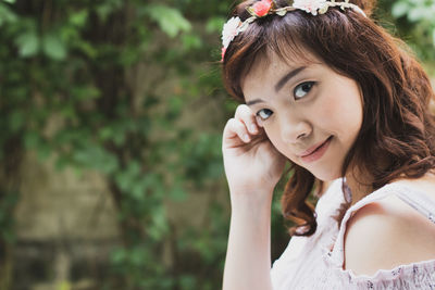 Portrait of smiling young woman