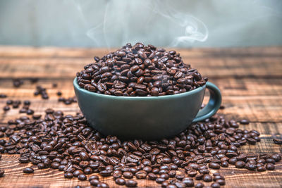 Close-up of coffee beans on table