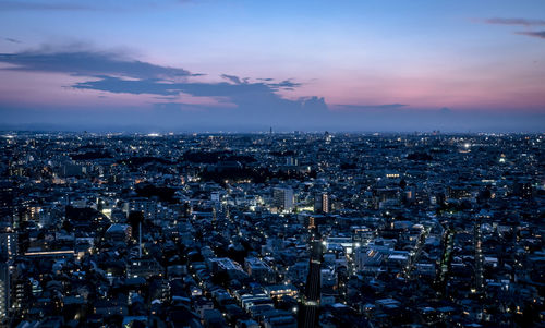 High angle view of city at dusk