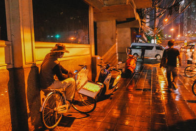 People on street at night