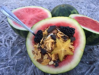 Breakfast cereal inside of watermelon