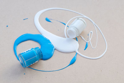 High angle view of blue container on beach