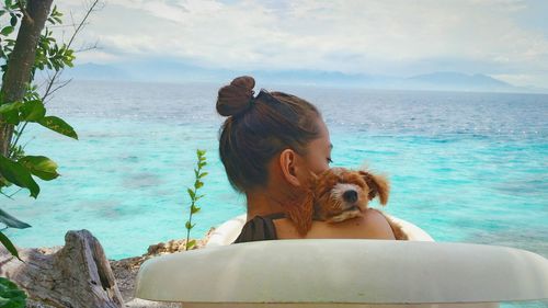 Scenic view of sea against cloudy sky