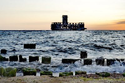 Scenic view of sea against sky during sunset