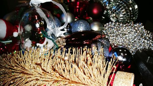 Close-up of christmas ornaments at night