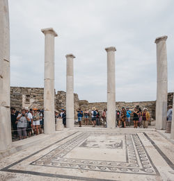 Group of people in front of historical building