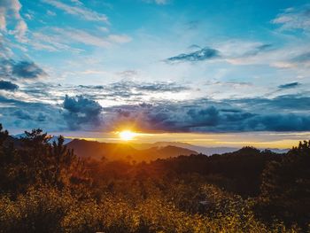 Scenic view of landscape against sky during sunset