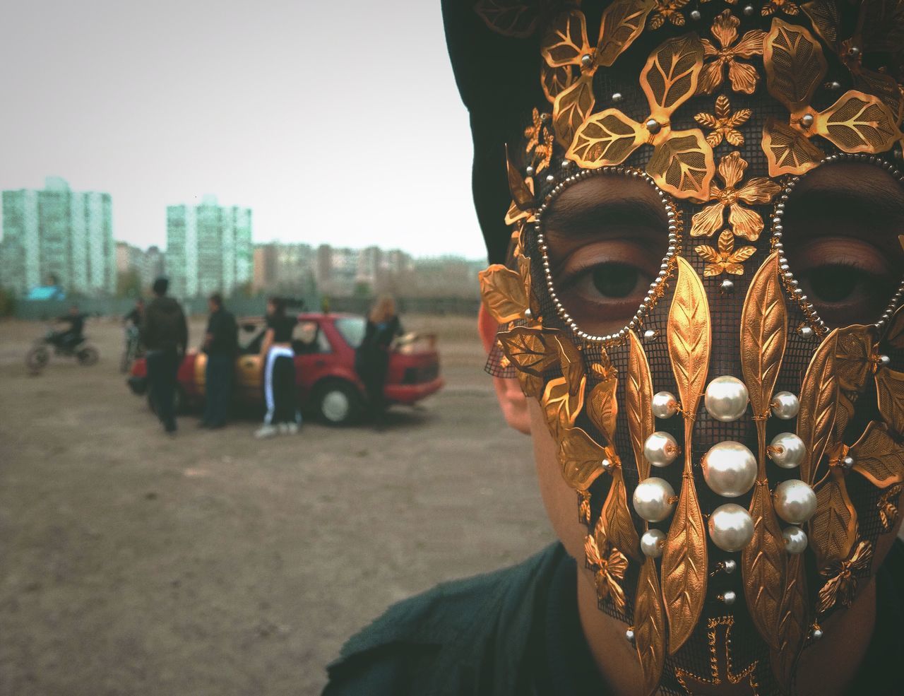 mask - disguise, real people, costume, venetian mask, disguise, carnival, men, lifestyles, day, outdoors, one person, close-up, people