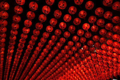 Full frame shot of red lanterns hanging outdoors