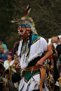 Group of people in traditional clothing during festival