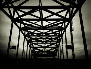 Low angle view of silhouette bridge