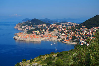 Scenic view of cityscape by adriatic sea