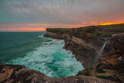 Scenic view of sea against sky during sunset