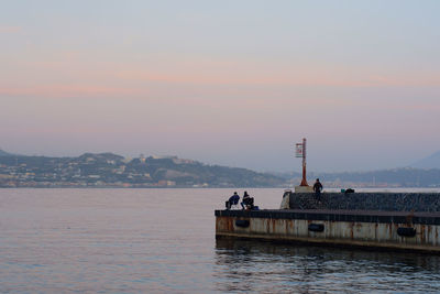 Scenic view of sea against sky at sunset