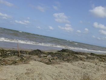 Scenic view of beach against sky