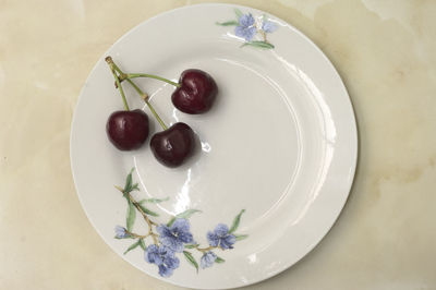 High angle view of fruits in plate on table