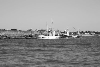 Boats sailing in sea