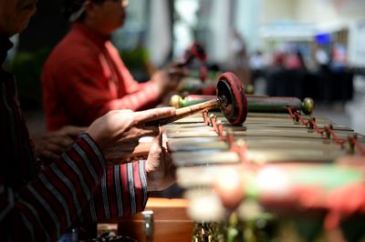 Man playing guitar at temple