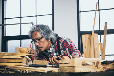 Man working on wood