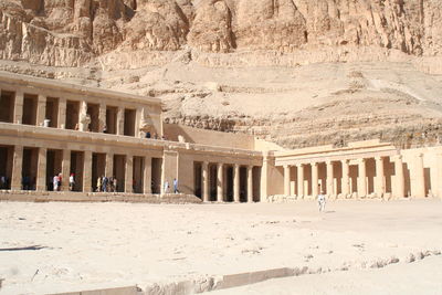 Group of people in front of historical building