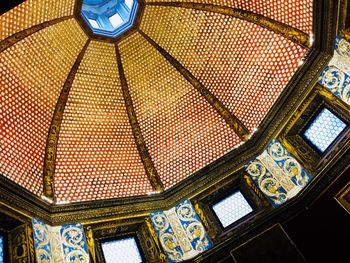 Low angle view of multi colored ceiling in building