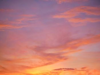 Low angle view of dramatic sky during sunset