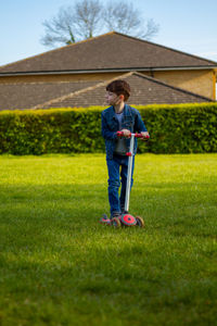 Boy standing on field