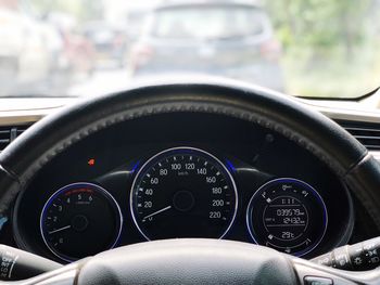 Close-up of speedometer in car