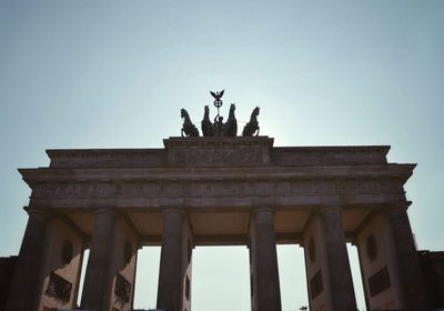 Low angle view of brandenburg gate against clear sky