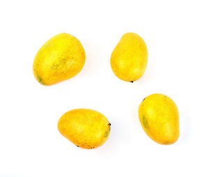 Close-up of fruits against white background