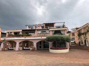 View of residential buildings against sky