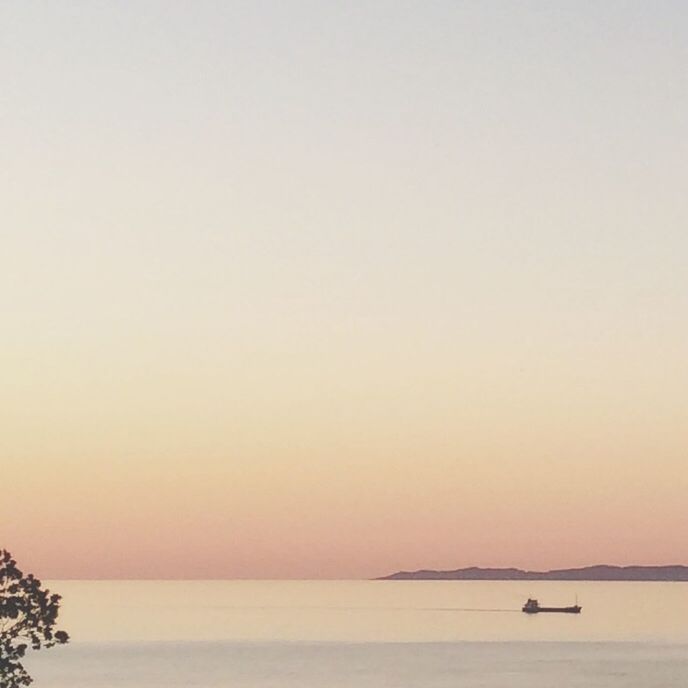 sea, horizon over water, water, sunset, copy space, tranquil scene, scenics, clear sky, tranquility, beauty in nature, orange color, nature, waterfront, idyllic, nautical vessel, silhouette, boat, transportation, seascape, sky