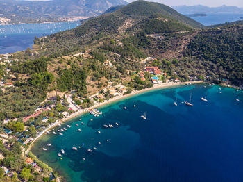 Desimi beach golf and nearby island with clear water in greece.