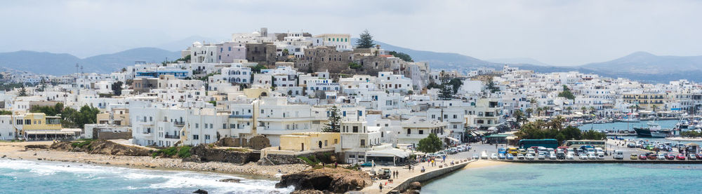 View of sea with buildings in background