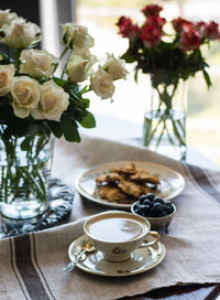 Close-up of flower vase on table