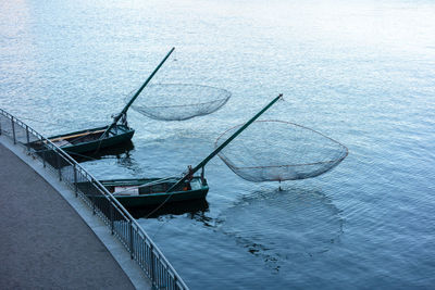 High angle view of fishing boat sailing in sea