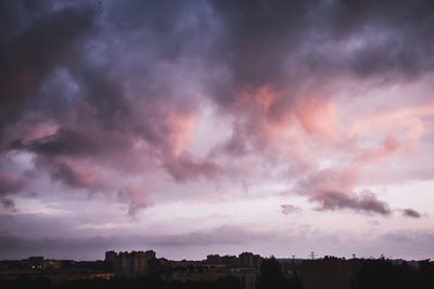 Storm clouds over city