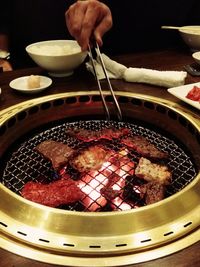 Close-up of meat on barbecue grill