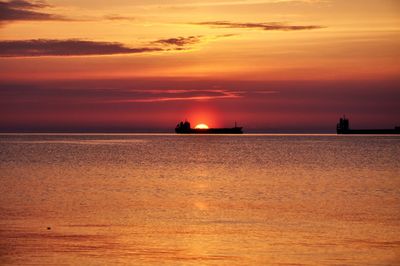 Scenic view of sea at sunset