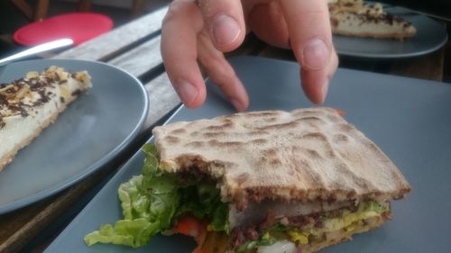 Close-up of hand holding food