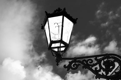 Low angle view of street light against sky