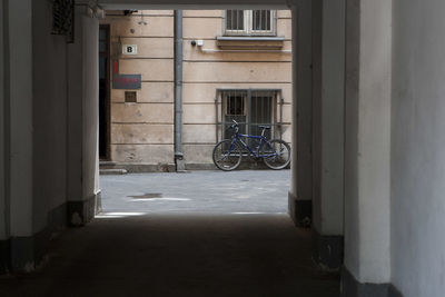 Alley amidst buildings in city