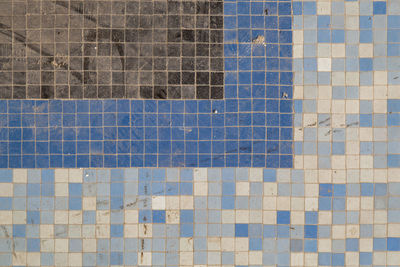 High angle view of swimming pool tiles 