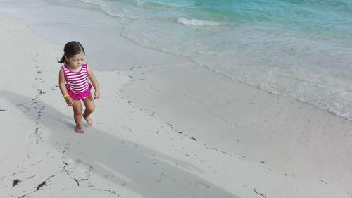 Full length of boy on beach