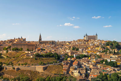 Panoramic view of old town against sky in city