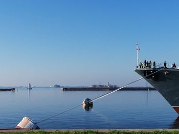 Scenic view of sea against clear blue sky