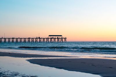 Scenic view of sea at sunset
